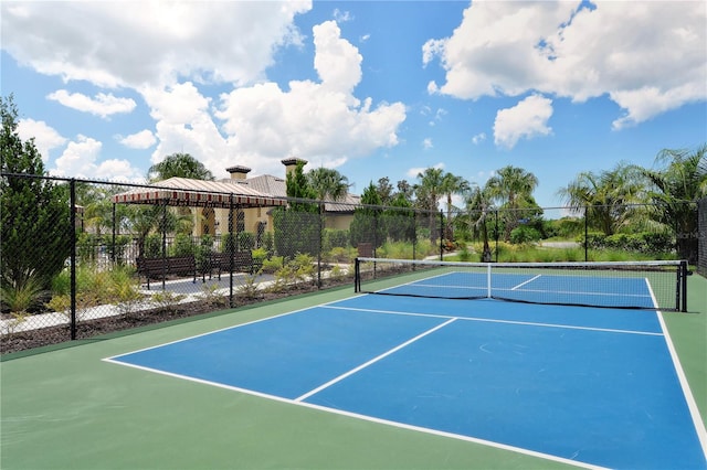 view of sport court with fence and community basketball court