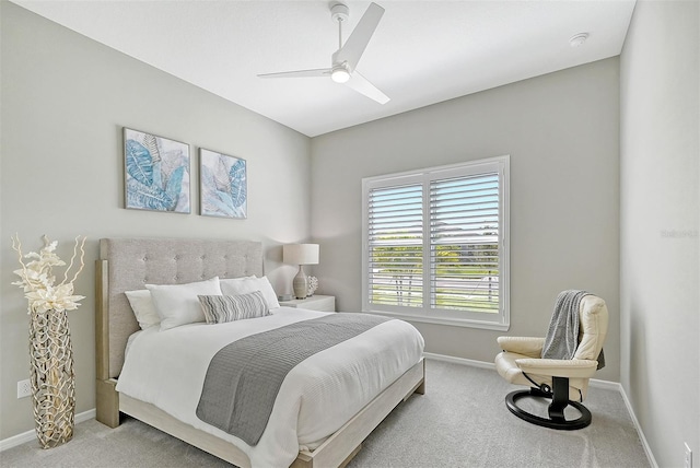 bedroom with ceiling fan and carpet floors