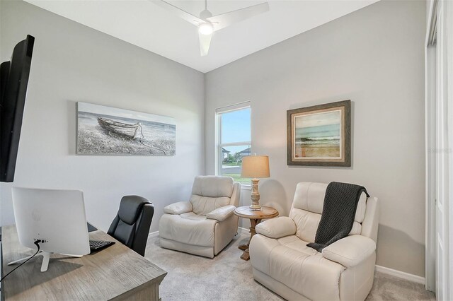 carpeted office with ceiling fan