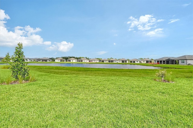 view of yard with a water view