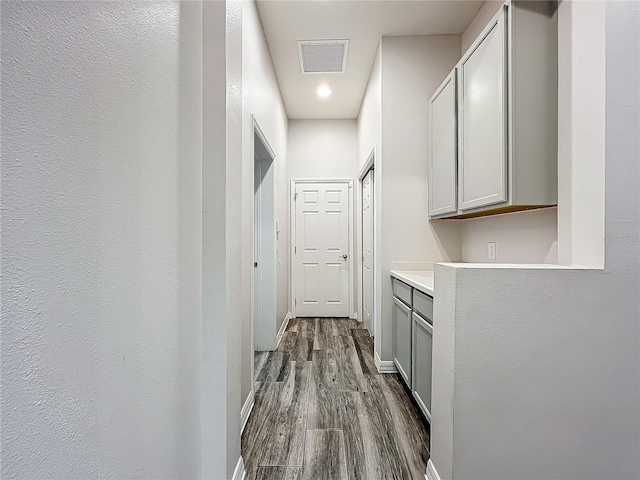 hall featuring dark hardwood / wood-style floors