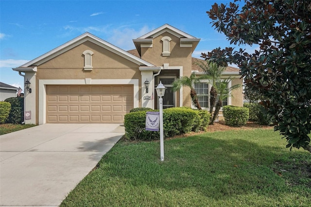 view of front facade with a garage and a front yard