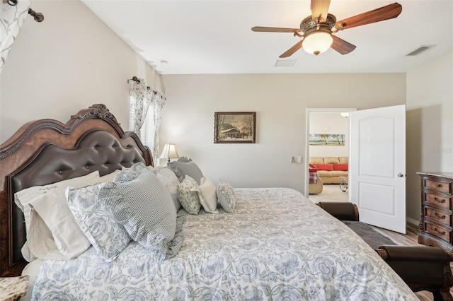 bedroom featuring ceiling fan and hardwood / wood-style floors