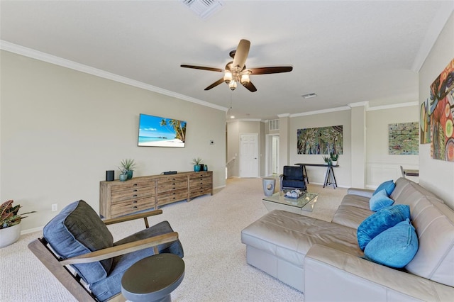 living room featuring ceiling fan, light colored carpet, and crown molding