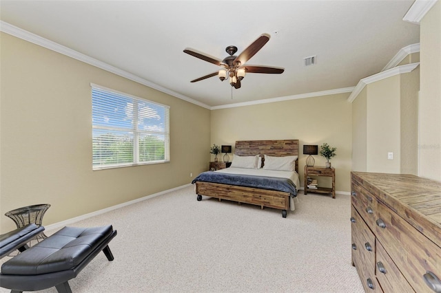 carpeted bedroom featuring ceiling fan and ornamental molding