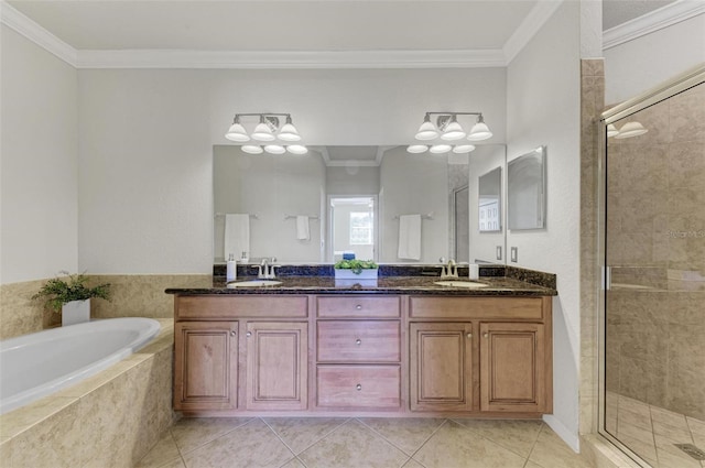 bathroom with tile patterned floors, crown molding, vanity, and separate shower and tub