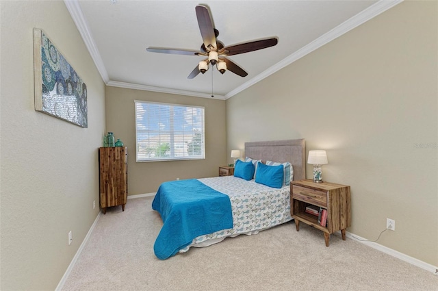 carpeted bedroom with ceiling fan and crown molding