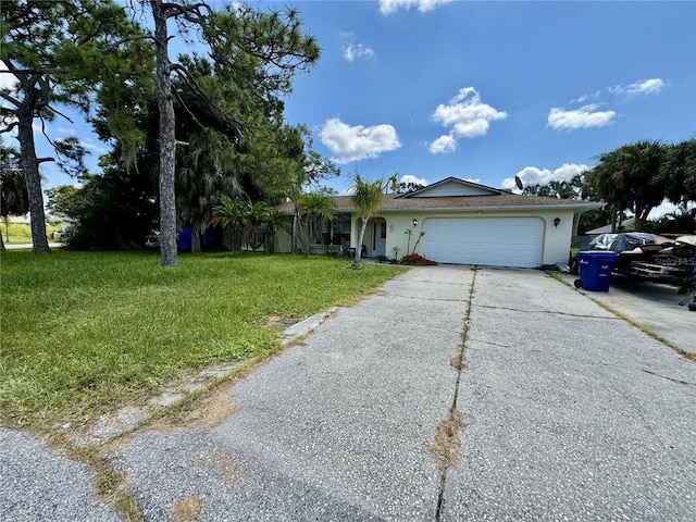 single story home with a front lawn and a garage