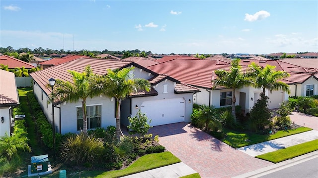 mediterranean / spanish house with a front yard