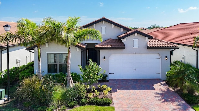 view of front of home with a garage