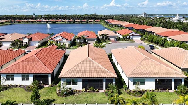 drone / aerial view with a water view