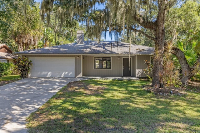 ranch-style house with a front lawn and a garage