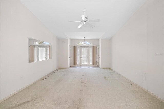 carpeted empty room with ceiling fan