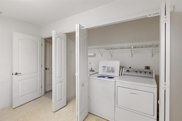 laundry room featuring independent washer and dryer