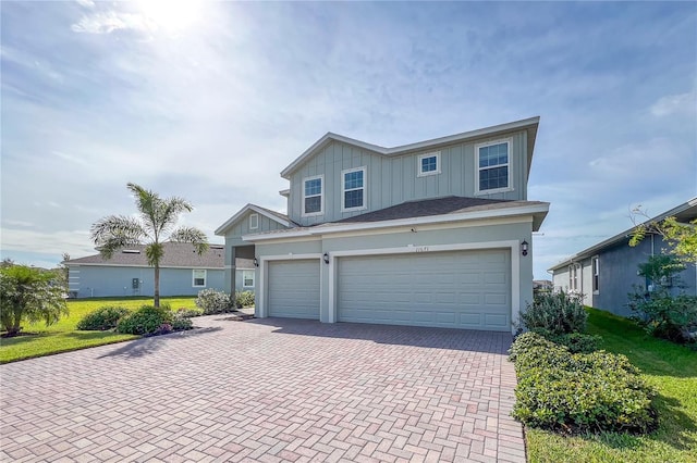 view of front of home with a garage