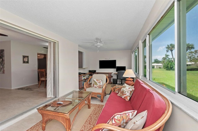 sunroom / solarium with ceiling fan and plenty of natural light