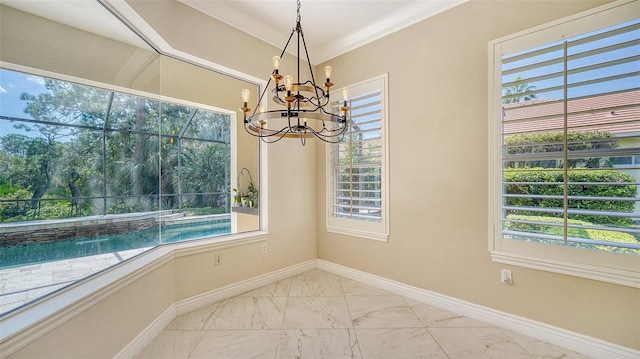 unfurnished dining area featuring a healthy amount of sunlight, crown molding, and a chandelier