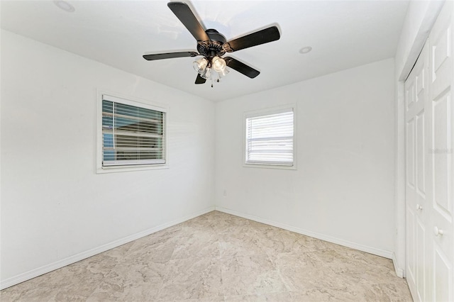 empty room featuring ceiling fan