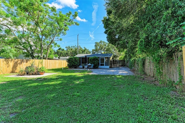 view of yard with a patio area