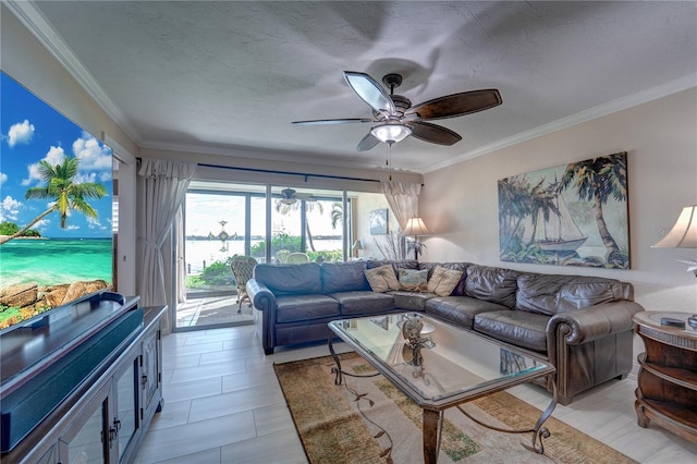 living room with ornamental molding, ceiling fan, and a textured ceiling