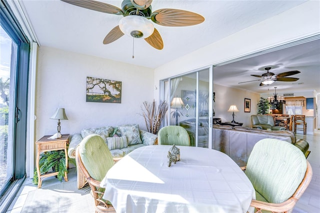 dining room featuring ceiling fan and hardwood / wood-style floors