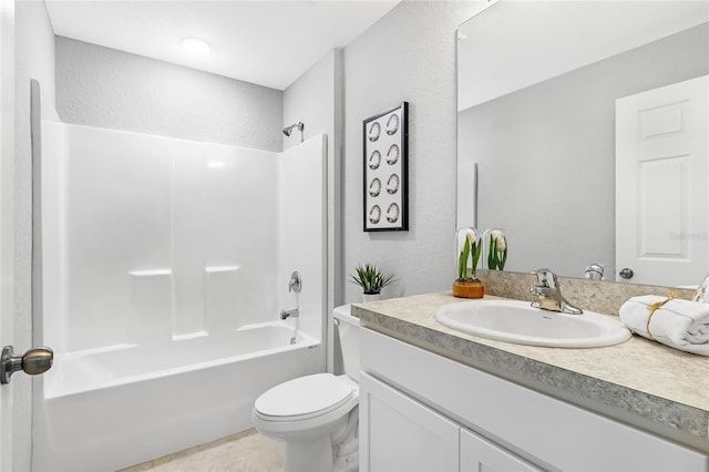 full bathroom with tub / shower combination, tile patterned flooring, vanity, and toilet