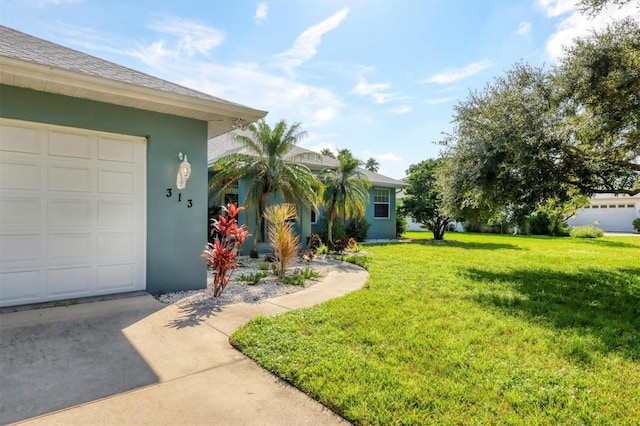 view of yard with a garage