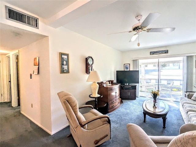 carpeted living room with ceiling fan