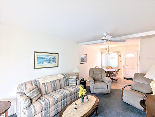 living room featuring hardwood / wood-style floors and ceiling fan