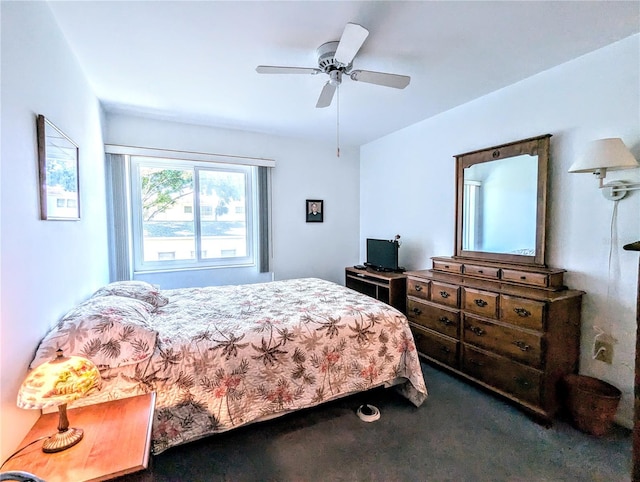 carpeted bedroom with ceiling fan