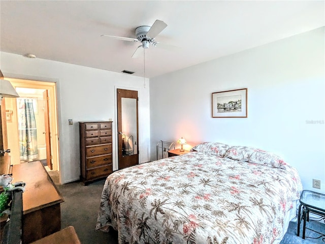 carpeted bedroom with ceiling fan