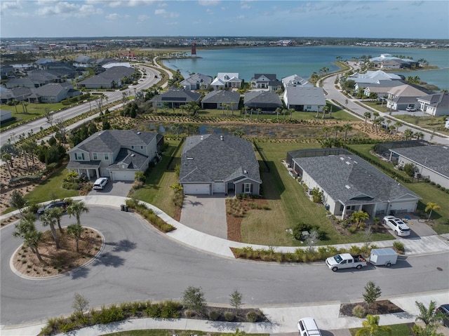 bird's eye view with a water view