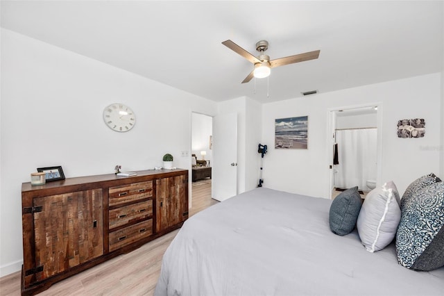 bedroom featuring light hardwood / wood-style flooring and ceiling fan