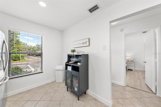 6050 28th St W Unit 14B, Bradenton, FL 34207 - interior space with light tile patterned flooring, baseboards, and visible vents