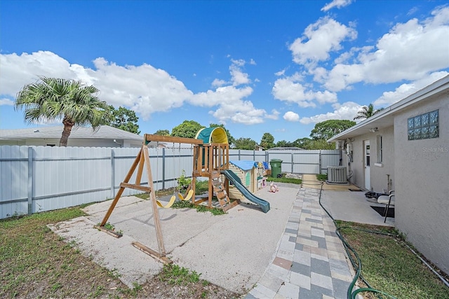 view of jungle gym with a patio and cooling unit