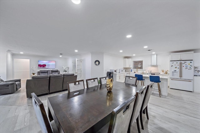 dining room with light hardwood / wood-style floors