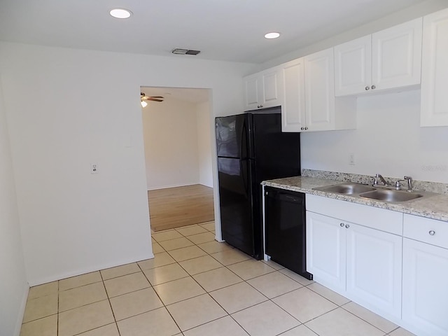 kitchen with ceiling fan, light tile patterned flooring, sink, white cabinetry, and black appliances