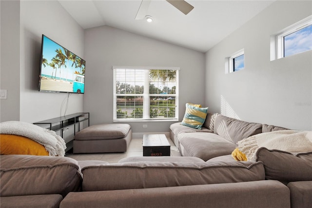 living room featuring ceiling fan and vaulted ceiling