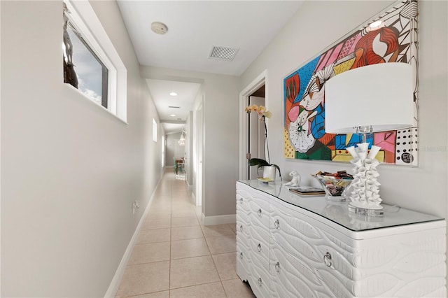 hallway with light tile patterned floors