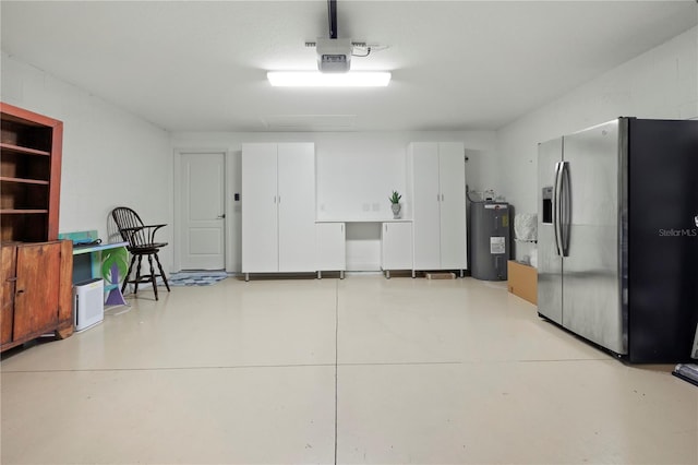 garage with stainless steel fridge, electric water heater, and a garage door opener