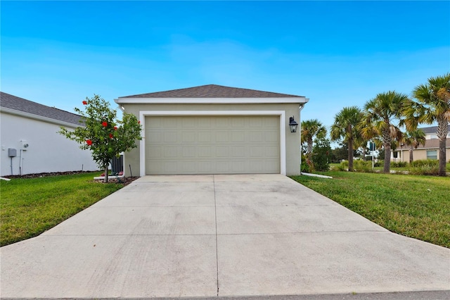 garage with a lawn