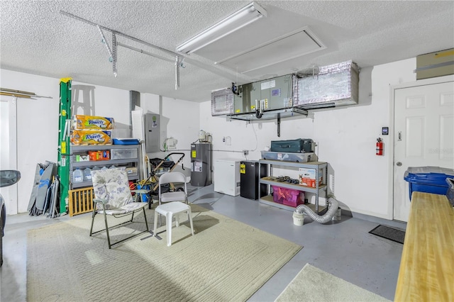 garage with electric water heater and electric panel