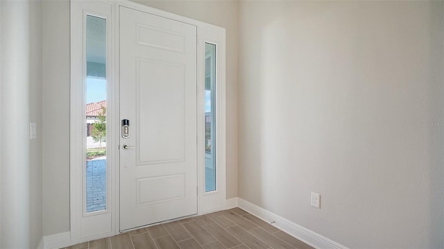 entrance foyer with hardwood / wood-style floors