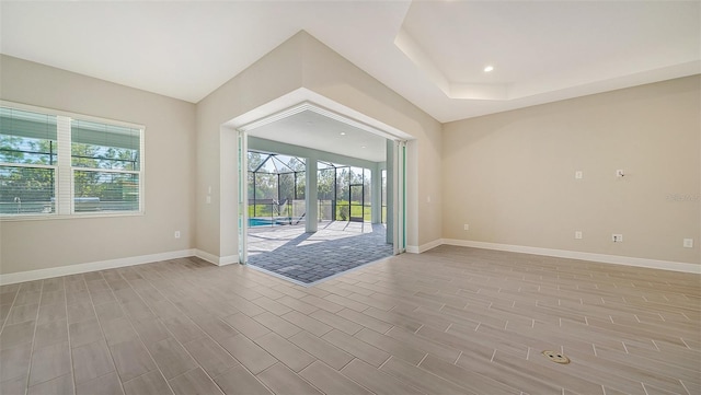 unfurnished room featuring light hardwood / wood-style floors and a healthy amount of sunlight