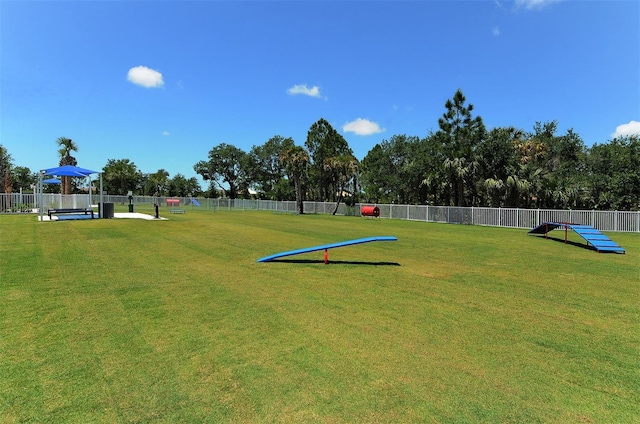 view of community featuring a yard