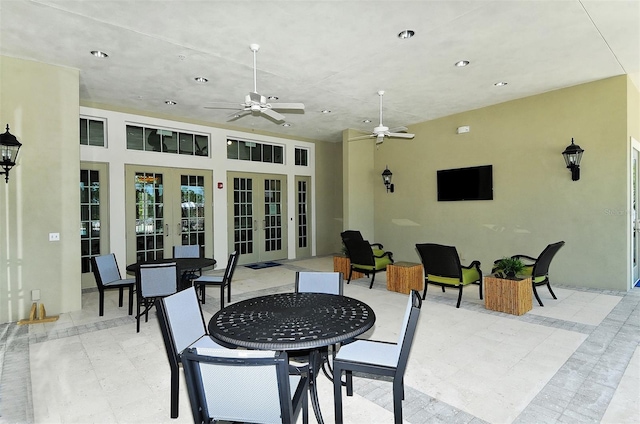 view of patio with ceiling fan and french doors