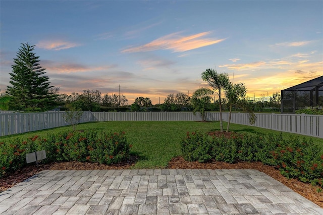 patio terrace at dusk with a lawn