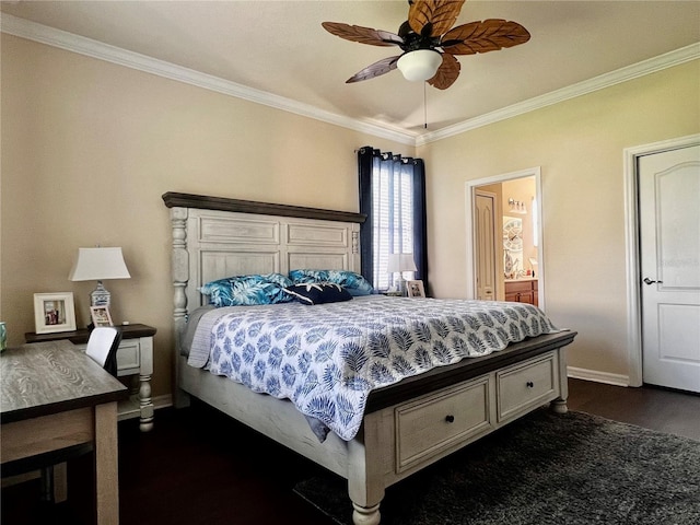 bedroom featuring crown molding, ceiling fan, dark hardwood / wood-style floors, and ensuite bath