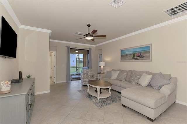 living room with light tile patterned floors, ornamental molding, and ceiling fan