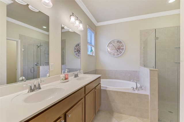 bathroom with ornamental molding, separate shower and tub, tile patterned floors, and vanity